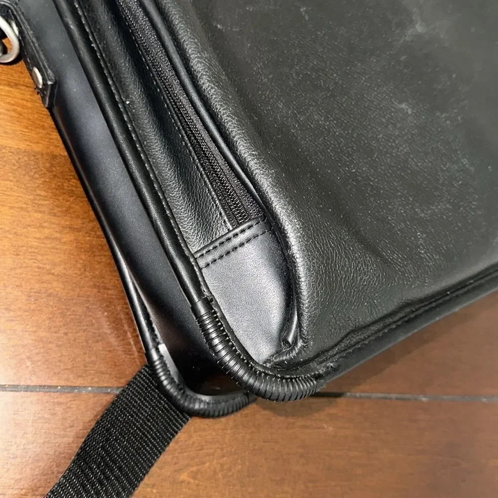 TARGUS Black Tech Padded Faux Leather Laptop Travel Bag with a Crossbody Strap